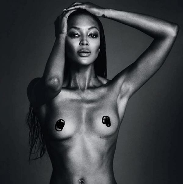 Naomi Campbell shows breast