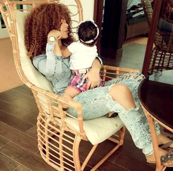 Nadia Buari and one of her twins